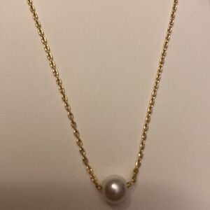 Gold plated and faux pearl adjustable necklace. 16- 18 inches NWT